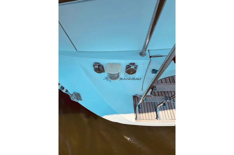 Slide: The Image of Jeanneau Sun Odyssey 45 DS 2008 yacht stern with deck and ladder. - 24