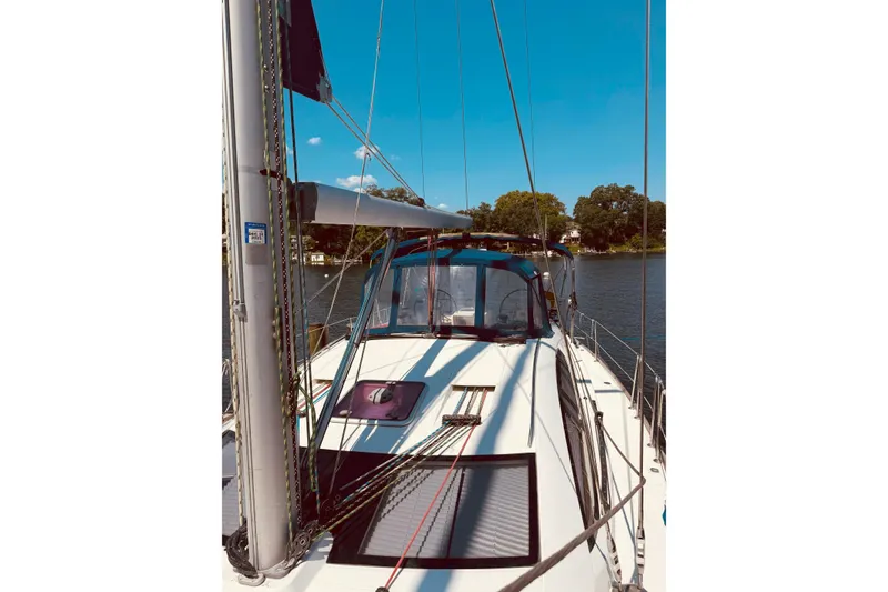Slide: The Image of 2008 Jeanneau Sun Odyssey 45 DS sailboat on calm water, clear sky background. - 29