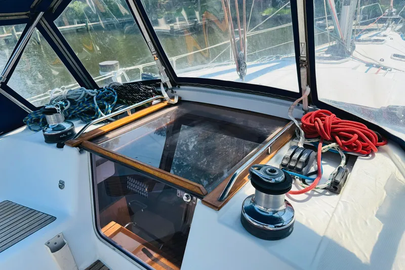 Slide: The Image of Cockpit of 2008 Jeanneau Sun Odyssey 45 DS sailboat with ropes and winches. - 4