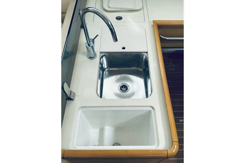 Slide: The Image of Galley sink area on 2008 Jeanneau Sun Odyssey 45 DS yacht. - 55