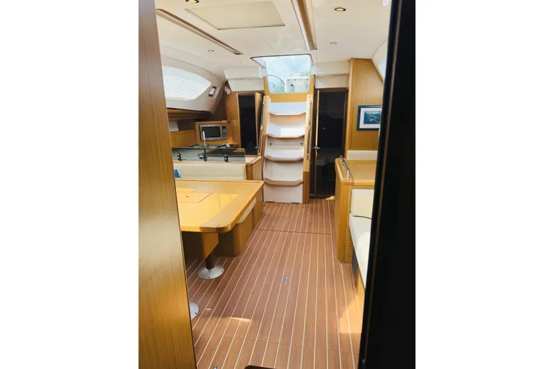 Slide: The Image of Interior of 2008 Jeanneau Sun Odyssey 45 DS sailboat, featuring wood finish and modern amenities. - 61