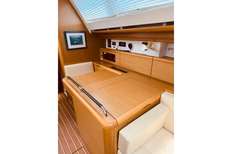 Slide: The Image of Interior of 2008 Jeanneau Sun Odyssey 45 DS yacht with wooden cabinetry and seating. - 63