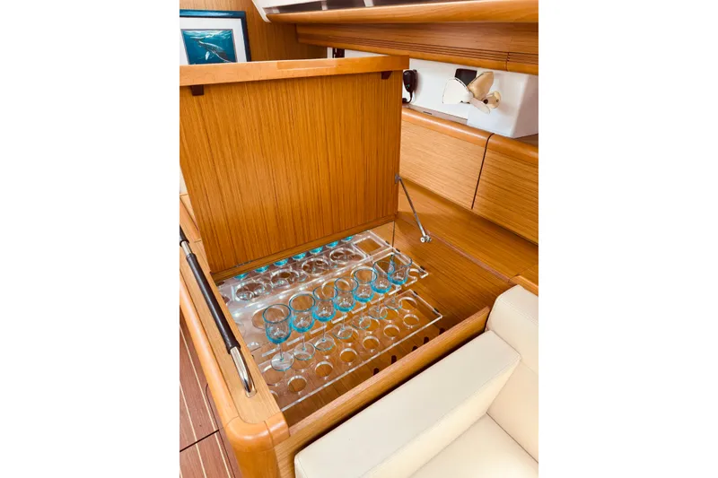 Slide: The Image of Interior of 2008 Jeanneau Sun Odyssey 45 DS with built-in glass storage. - 65