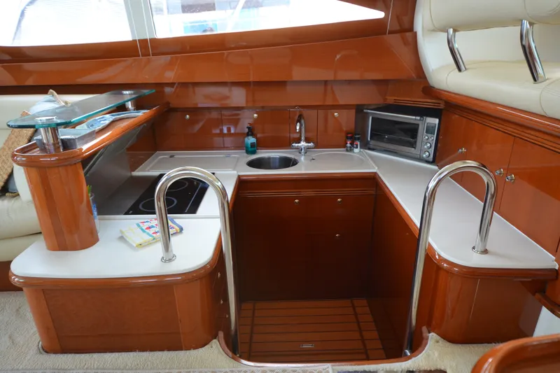 Slide: The Image of Luxurious kitchen interior of 2007 Jeanneau Prestige 46 yacht with modern amenities. - 26