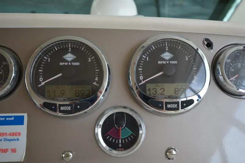 Slide: The Image of Dashboard of a 2007 Jeanneau Prestige 46 yacht showing RPM and voltage gauges. - 34