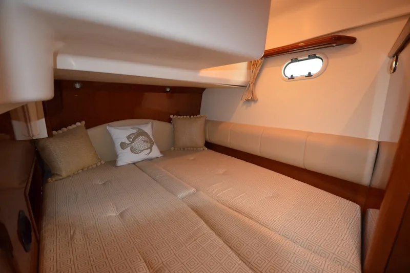 Slide: The Image of Luxurious cabin interior of 2007 Jeanneau Prestige 46 yacht with cozy bedding. - 36