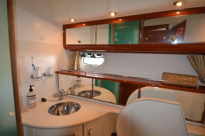 Slide: The Image of Luxurious bathroom in 2007 Jeanneau Prestige 46 yacht with modern fixtures and ample storage. - 43