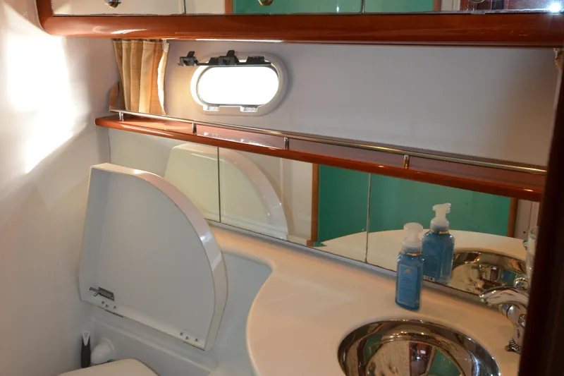 Slide: The Image of Bathroom interior of 2007 Jeanneau Prestige 46 yacht with sink and mirror. - 47