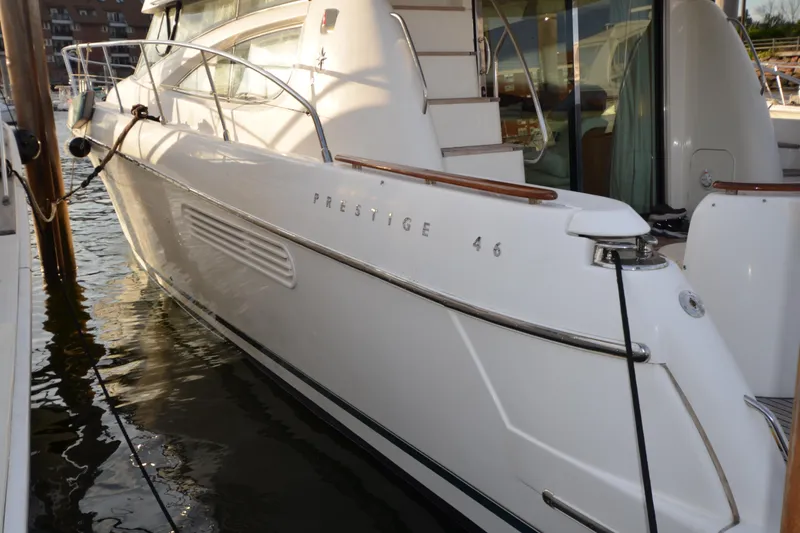 Slide: The Image of 2007 Jeanneau Prestige 46 yacht docked at marina, side view. - 5