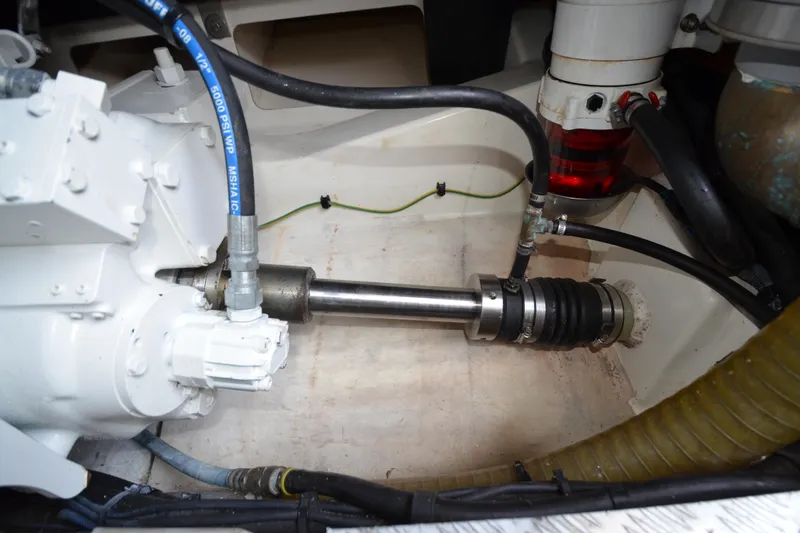 Slide: The Image of Engine compartment of a 2007 Jeanneau Prestige 46 yacht, showcasing mechanical components. - 56