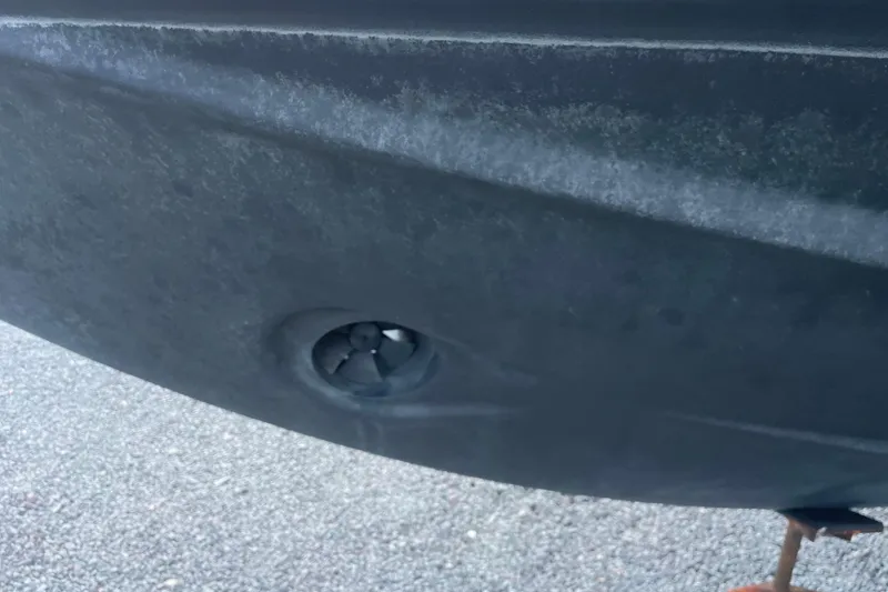 Slide: The Image of Close-up of Jeanneau Prestige 46 hull, showcasing a bow thruster, 2007 model. - 61