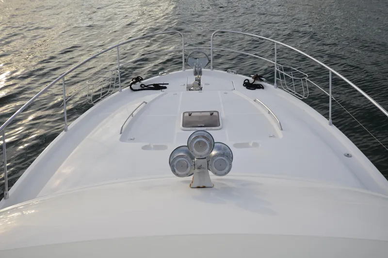 Slide: The Image of Bow view of 2007 Jeanneau Prestige 46 yacht on calm water. - 7