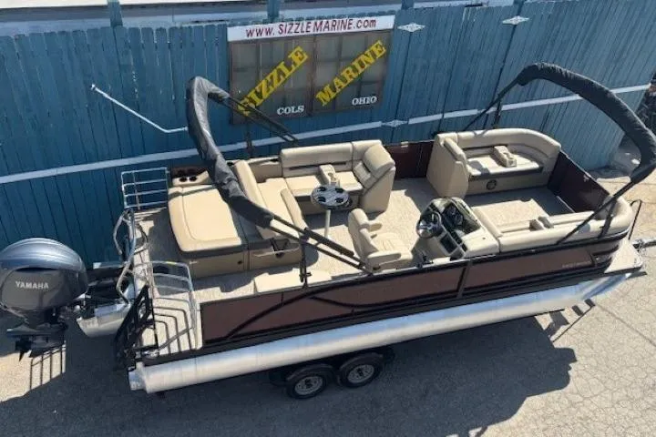 Slide: The Image of 2024 Godfrey SWEETWATER 2286 SFL pontoon boat with Yamaha engine, displayed at Sizzle Marine. - 10