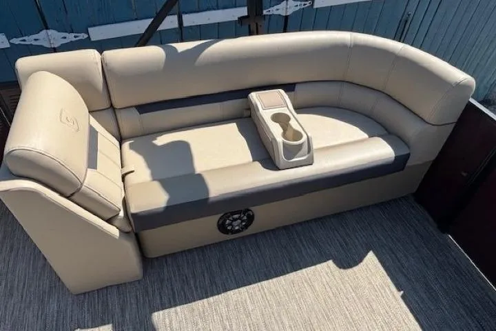 Slide: The Image of 2024 Godfrey SWEETWATER 2286 SFL boat seating with cup holders, beige upholstery. - 14