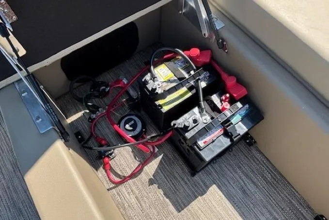 Slide: The Image of Battery compartment of 2024 Godfrey SWEETWATER 2286 SFL pontoon boat, featuring wiring and connections. - 31