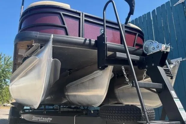 Slide: The Image of 2024 Godfrey SWEETWATER 2286 SFL pontoon boat on trailer, viewed from below. - 6
