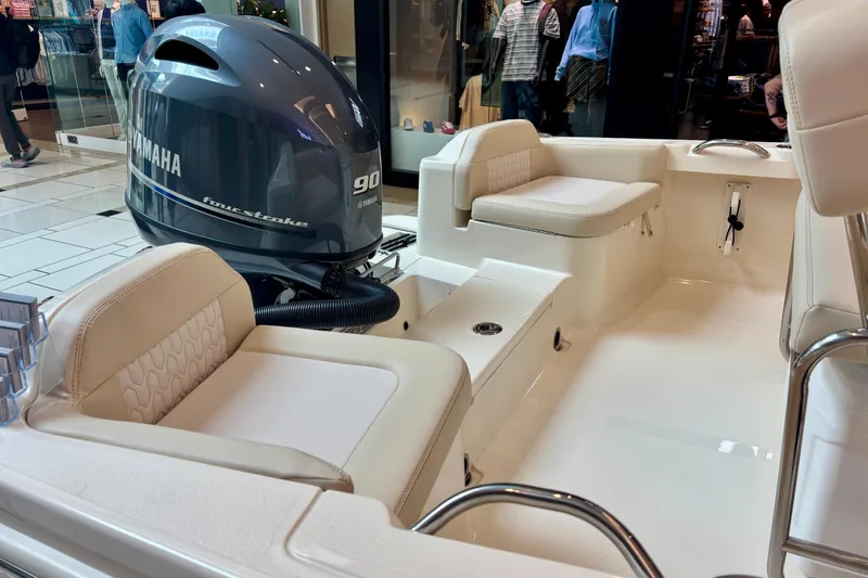 Slide: The Image of 2026 Scout 188 Sportfish boat interior with Yamaha 90 four-stroke engine. - 4