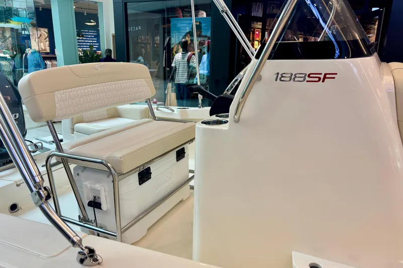 Slide: The Image of 2026 Scout 188 Sportfish interior with seating and console details. - 7