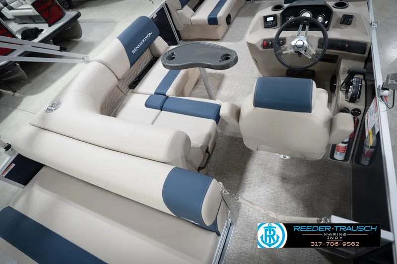 Slide: The Image of Interior of 2026 Bennington 168 SLJ pontoon boat with beige and blue seating. - 14