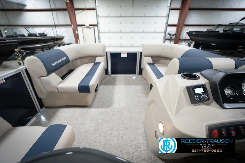 Slide: The Image of 2026 Bennington 168 SLJ pontoon boat interior with plush seating and modern helm. - 20