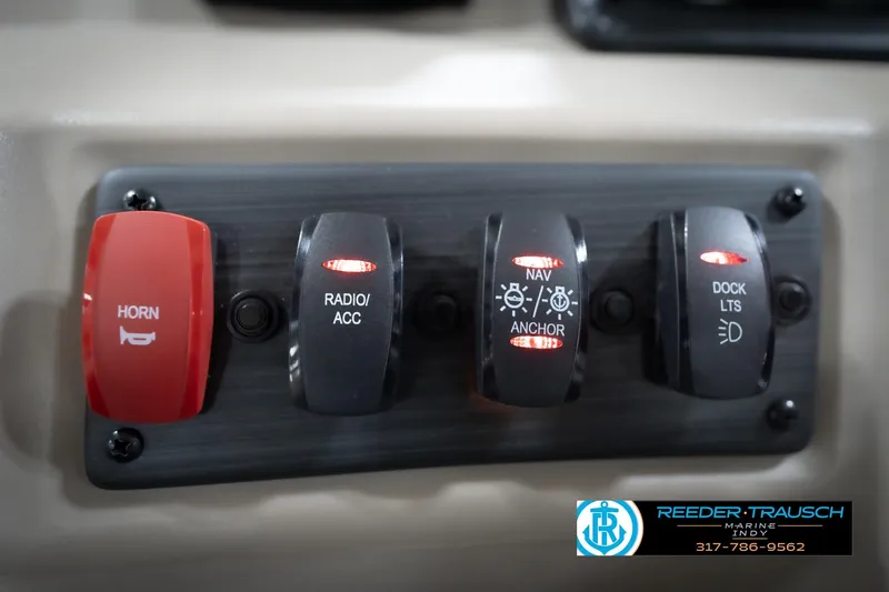 Slide: The Image of Close-up of 2026 Bennington 168 SLJ steering wheel with Reeder-Trausch Marine logo. - 37