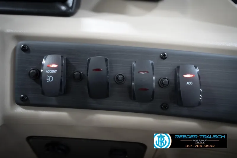 Slide: The Image of Dashboard gauges of 2026 Bennington 168 SLJ boat, featuring RPM, trim, and fuel indicators. - 40