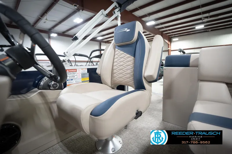 Slide: The Image of Throttle control of 2026 Bennington 168 SLJ boat with safety warnings and Reeder-Trausch Marine logo. - 42
