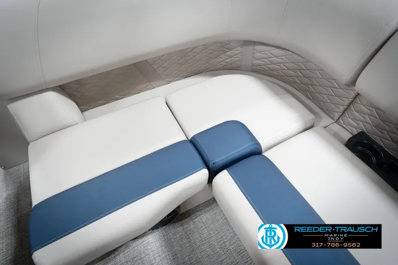 Slide: The Image of 2026 Bennington 168 SLJ boat seat with logo, featuring blue and beige upholstery. - 44