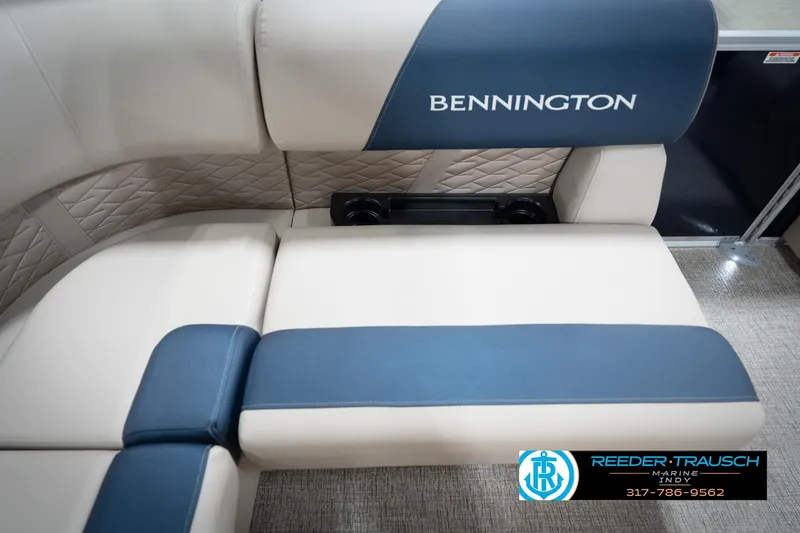 Slide: The Image of Luxurious seating in 2026 Bennington 168 SLJ boat with blue accents and quilted design. - 45