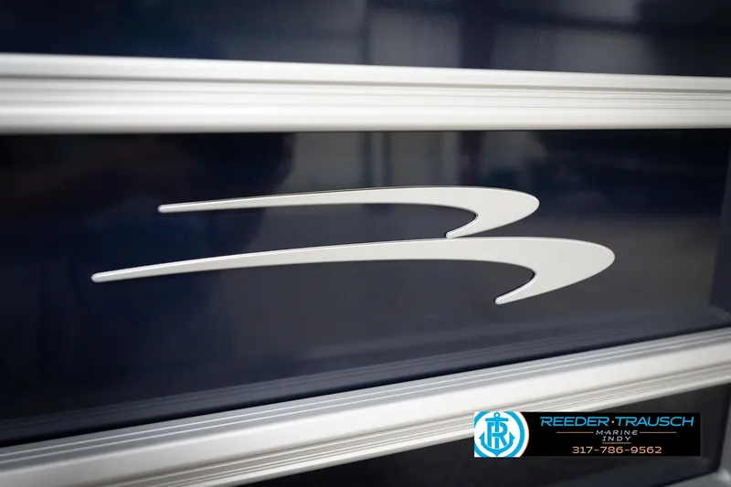 Slide: The Image of Carpet texture inside 2026 Bennington 168 SLJ boat, featuring Reeder-Trausch Marine logo. - 52
