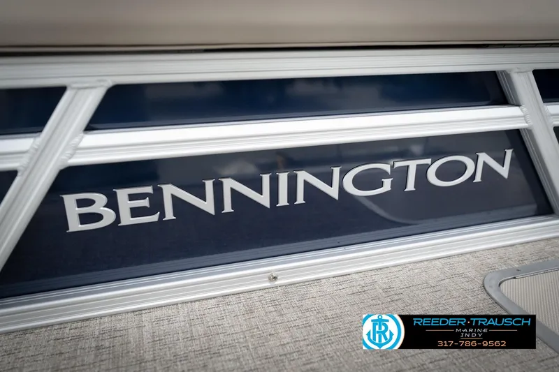 Slide: The Image of 2026 Bennington 168 SLJ boat with sleek design and branding. - 54