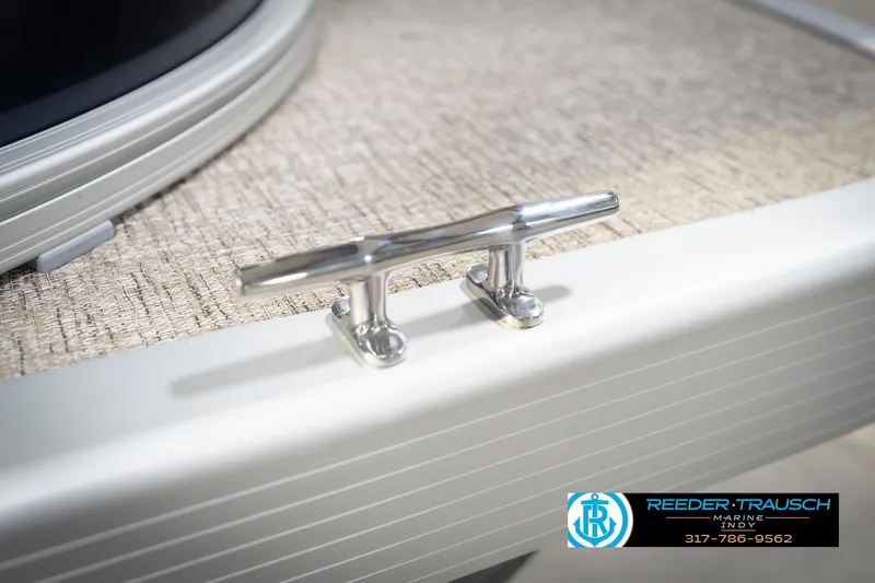 Slide: The Image of 2026 Bennington 168 SLJ pontoon boat with cover in showroom. - 57