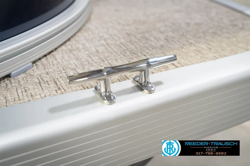 Slide: The Image of 2026 Bennington 168 SLJ boat cleat detail with Reeder Trausch Marine logo. - 64