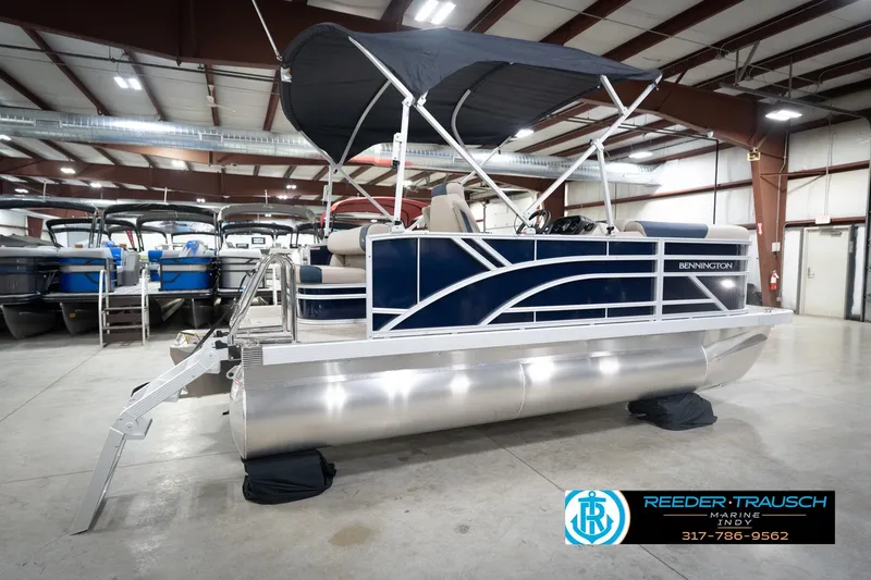 Slide: The Image of 2026 Bennington 168 SLJ pontoon boat with canopy in showroom. - 8