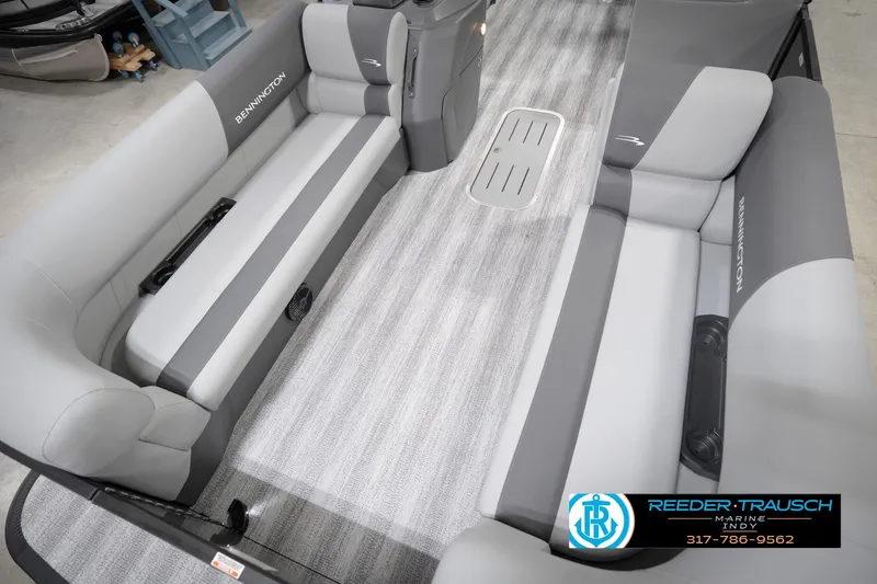Slide: The Image of 2026 Bennington 21 SL pontoon boat interior with gray seating and flooring. - 12