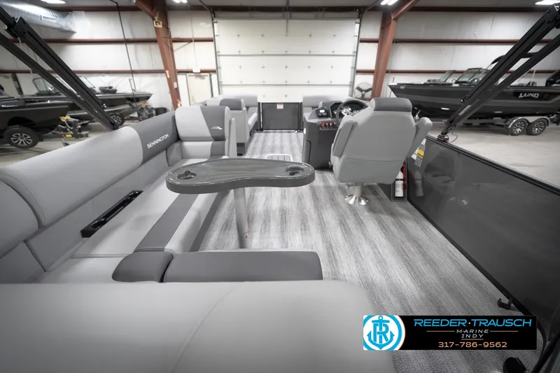 Slide: The Image of 2026 Bennington 21 SL pontoon boat interior with gray seating and modern design. - 19