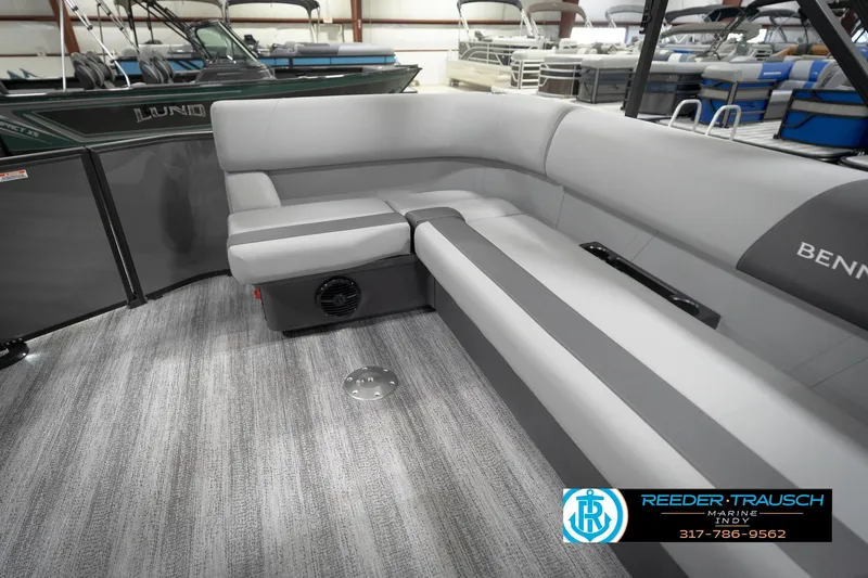 Slide: The Image of 2026 Bennington 21 SL pontoon boat interior with gray seating and carpeted flooring. - 31