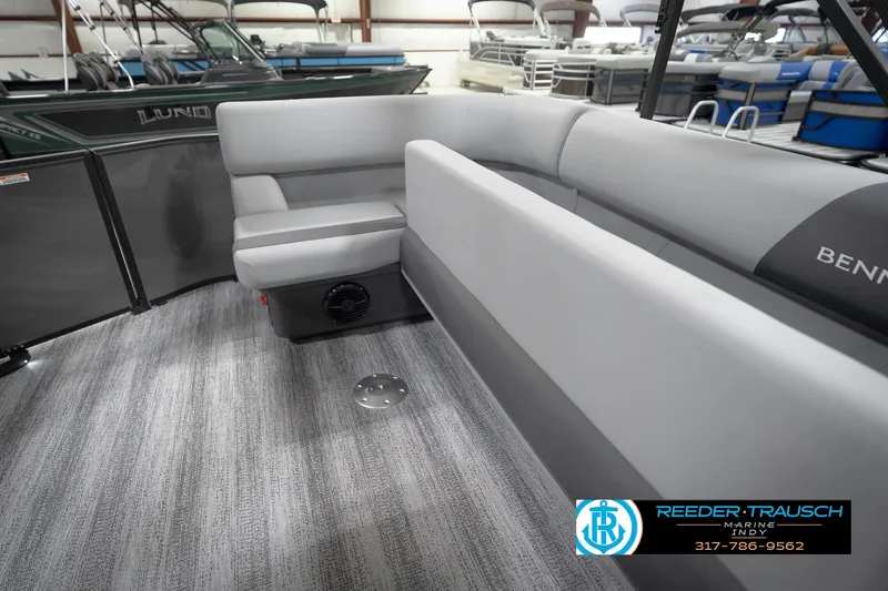 Slide: The Image of 2026 Bennington 21 SL pontoon boat interior with gray seating and carpeted flooring. - 33