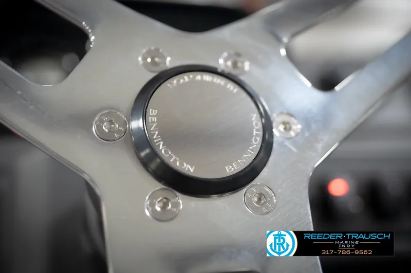Slide: The Image of Close-up of 2026 Bennington 21 SL steering wheel with Reeder-Trausch Marine logo. - 36