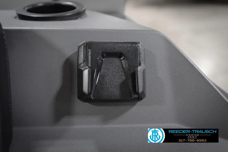 Slide: The Image of 2026 Bennington 21 SL boat interior detail with cup holder and accessory mount. - 40