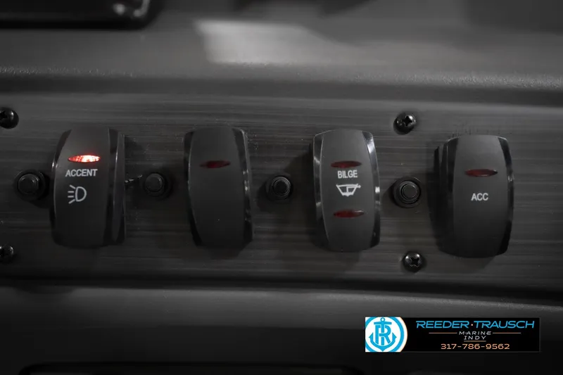 Slide: The Image of Control panel of 2026 Bennington 21 SL boat with accent, bilge, and accessory switches. - 41