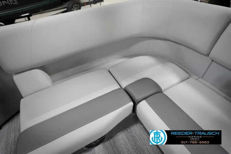 Slide: The Image of 2026 Bennington 21 SL boat interior with gray seating and modern design. - 45