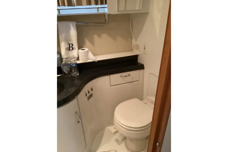 Slide: The Image of Bathroom interior of 2005 Carver 41 Cockpit Motor Yacht with modern amenities. - 43