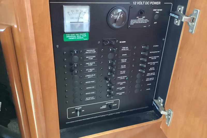 Slide: The Image of Electrical control panel on a 2005 Carver 41 Cockpit Motor Yacht. - 32
