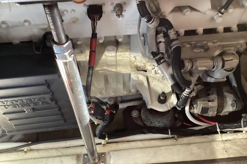 Slide: The Image of Engine compartment of a 2005 Carver 41 Cockpit Motor Yacht with Volvo Penta components. - 51