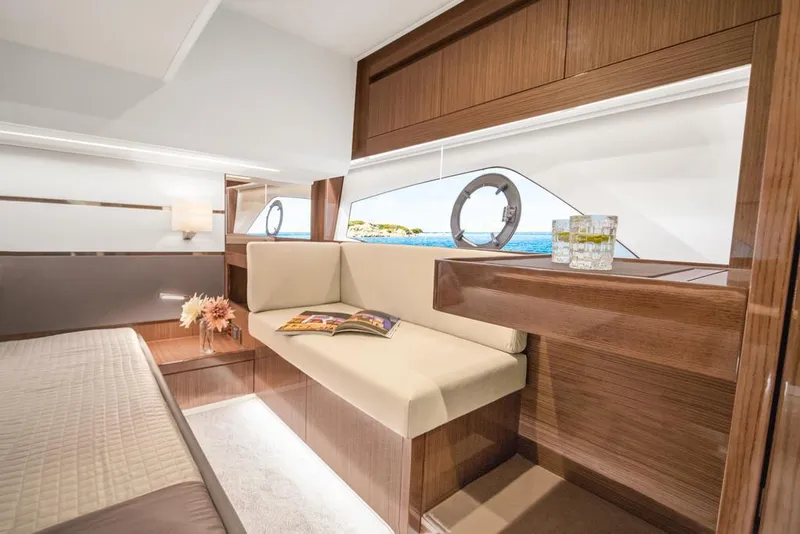 Slide: The Image of Luxurious interior of 2026 Sealine C430 yacht with elegant wood finishes and ocean view. - 27