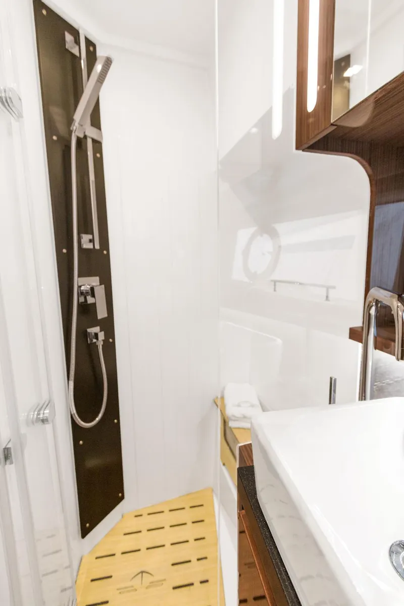 Slide: The Image of 2026 Sealine C430 yacht bathroom with modern shower and sleek fixtures. - 29