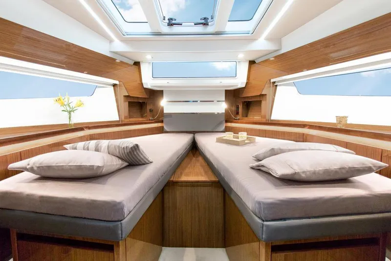Slide: The Image of 2026 Sealine C430 yacht interior with twin beds and skylight. - 31