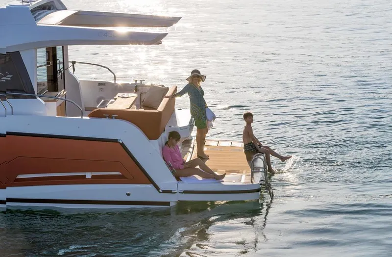 Slide: The Image of 2026 Sealine C430 yacht with people enjoying the sun on the deck. - 6