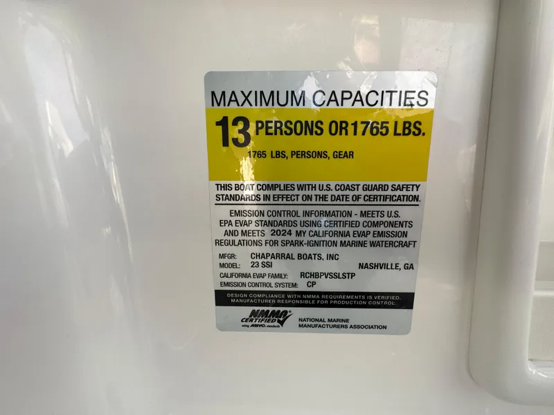 Slide: The Image of 2024 Chaparral 23 SSi boat capacity label: 13 persons or 1765 lbs. - 22
